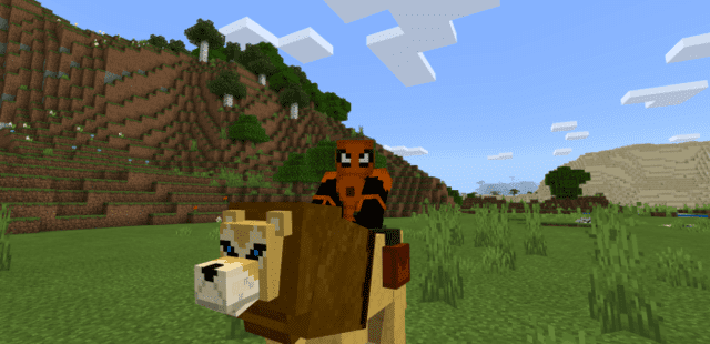 The player with the Spiderman skin sits on a lion with a cat saddle installed on it