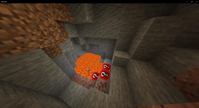 Lucky blocks generated in a cave next to a lava pool